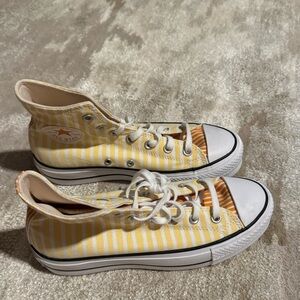 Orange and yellow striped platform Converse
